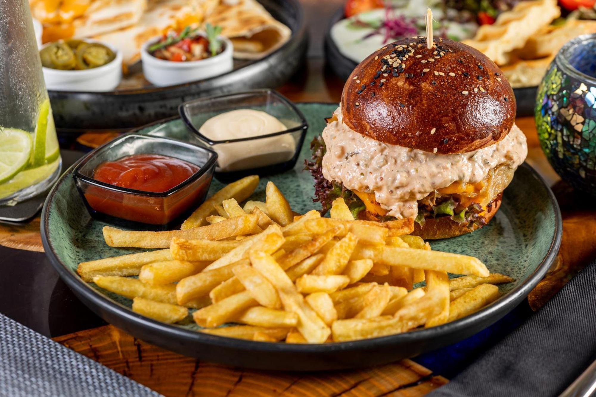 Theory Hotel Tbilisi Exterior photo A burger with fries